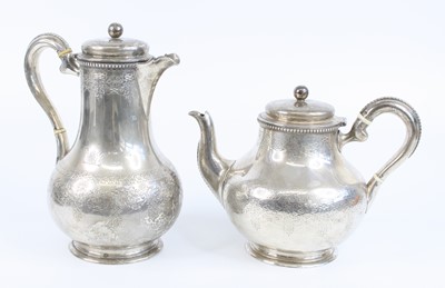 Lot 1179 - A Victorian silver tea and coffee pot duo,...