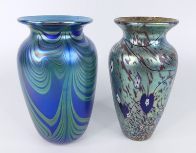 Lot 79 - Two Okra iridescent art glass vases, each of...