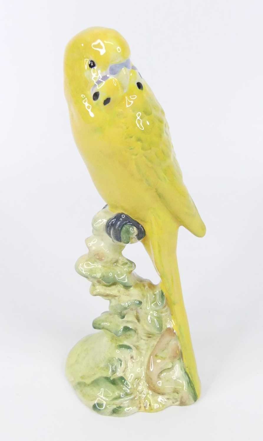 Lot 48 - A Beswick pottery yellow budgerigar, facing...