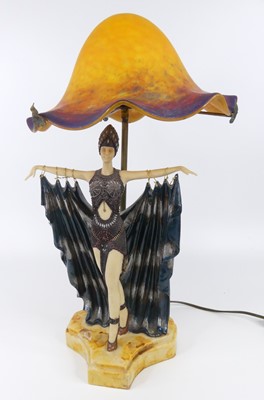 Lot 163 - After Chiparus - a painted resin table...