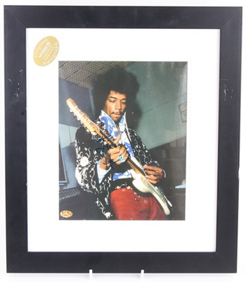 Lot 801 - Jimi Hendrix, a 24.5 x 20cm colour image of...