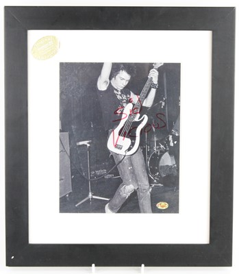 Lot 803 - Sid Vicious, a 24 x 19cm black and white image...