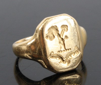 Lot 1258 - An 18ct yellow gold oblong signet ring, the...