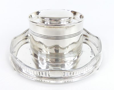 Lot 100 - A circa 1900 silver capstan inkwell, the...