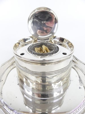 Lot 100 - A circa 1900 silver capstan inkwell, the...