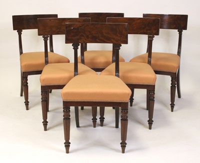 Lot 1539 - A set of six late Regency mahogany barback...