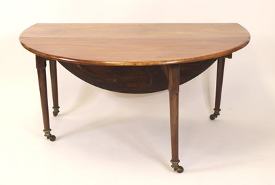 Lot 1562 - A George III mahogany dropleaf dining table,...