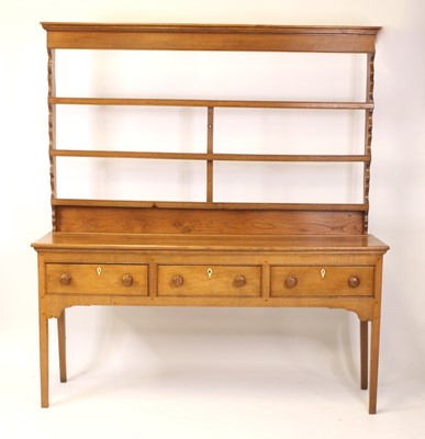 Lot 1571 - A George III joined blond oak and elm dresser,...