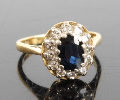 Lot 1301 - An 18ct yellow and white gold, sapphire and...