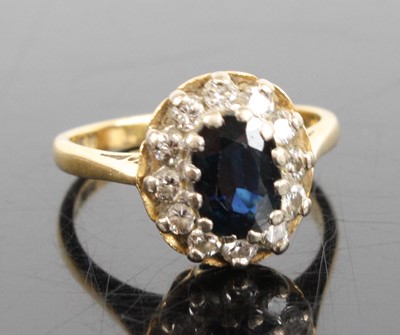 Lot 2710 - An 18ct yellow and white gold, sapphire and...