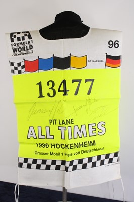 Lot 839 - Formula 1 interest, a pit lane marshall's...