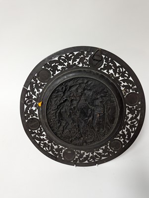 Lot 2 - A copper and pewter charger, repousse...