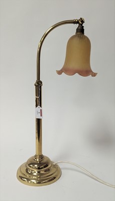 Lot 5 - An adjustable brass table lamp, having a...