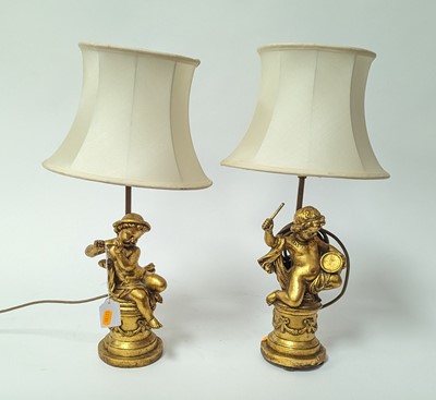 Lot 7 - A pair of gilt figural composite table lamps,...