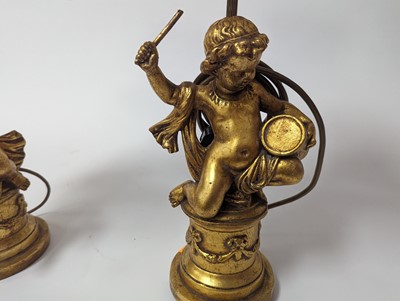 Lot 7 - A pair of gilt figural composite table lamps,...