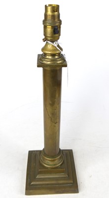 Lot 10 - A brass table lamp, in the form of a column, h....