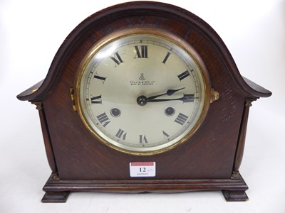 Lot 12 - A Victorian carved oak clock/barometer, h.41cm;...