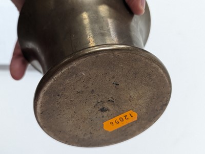 Lot 27 - An antique brass mortar, h.9cm