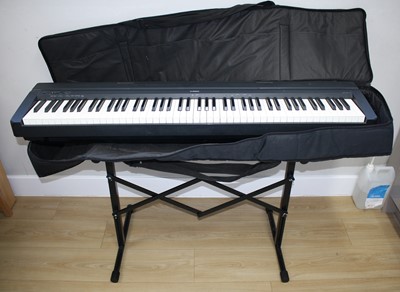 Lot 536 - A Yamaha P-35 digital piano, with stand, pedal...