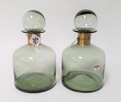 Lot 29 - A pair of modern green glass bottles, each...