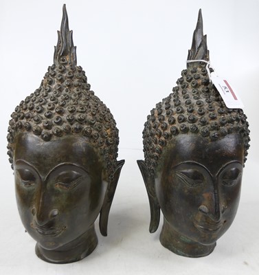 Lot 53 - A pair of bronzed Buddha heads, h.28cm