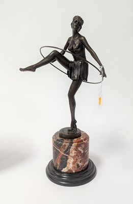 Lot 59 - An Art Deco style bronzed metal figure of a...