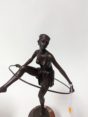 Lot 59 - An Art Deco style bronzed metal figure of a...