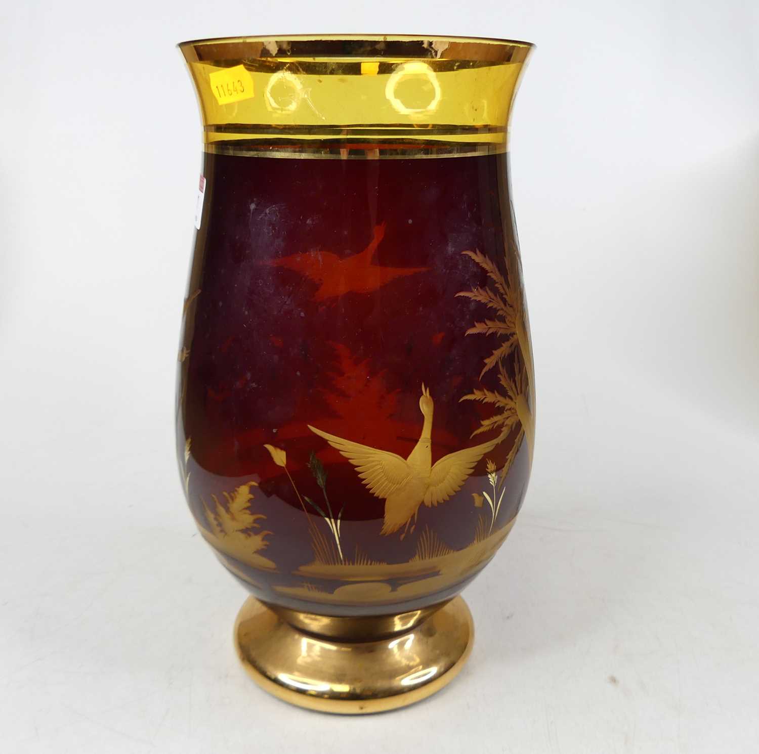 Lot 67 - A 20th century ruby glass vase, of baluster...