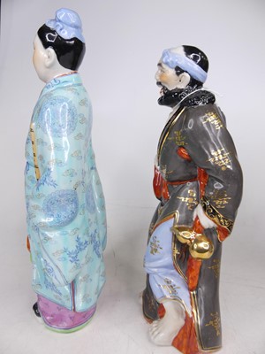 Lot 119 - A set of 20th century Chinese pottery figures...