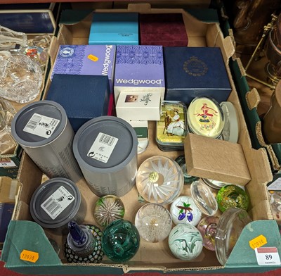 Lot 89 - A collection of glass paperweights, to include...