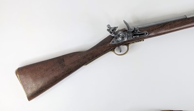 Lot 93 - A reproduction flintlock muzzle loading rifle,...