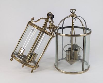 Lot 99 - A glazed brass three-light hall lantern, of...