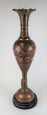 Lot 126 - An Indian enamel decorated brass vase, having...