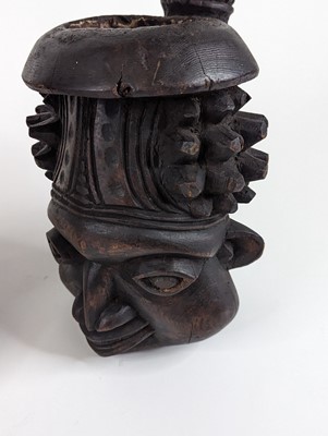 Lot 150 - An African carved softwood fertility figure,...