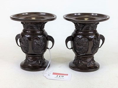 Lot 219 - A pair of Japanese bronzed vases, each relief...