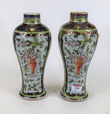 Lot 250 - A pair of Chinese porcelain vases, each of...