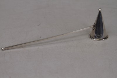 Lot 300 - An Elizabeth II silver candle-snuffer, of...