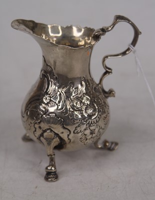 Lot 302 - An 18th century silver cream jug, of baluster...