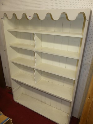 Lot 1154 - A painted pine freestanding open bookshelf,...