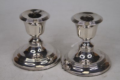 Lot 311 - A pair of Edwardian dwarf silver table...