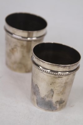 Lot 312 - A pair of French silver beakers, of...