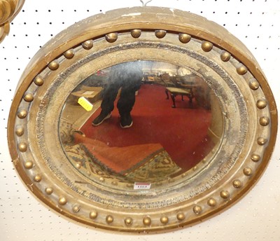 Lot 1164 - A circa 1900 gilt wood circular convex wall...