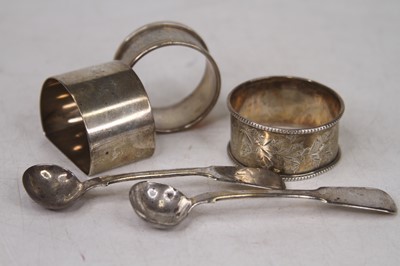 Lot 321 - Three silver napkin rings; together with a...