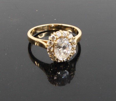 Lot 332 - A modern 14ct yellow gold and cz set cluster...