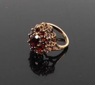 Lot 334 - A modern 9ct gold garnet set cluster ring,...