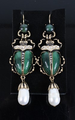 Lot 335 - A pair of gilt metal and paste set scarab...