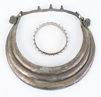 Lot 352 - An African white metal collar; together with...