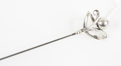 Lot 360 - A George V silver hat-pin by Charles Horner,...