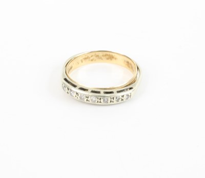 Lot 374 - A 9ct gold carved wedding band, size K/L;...