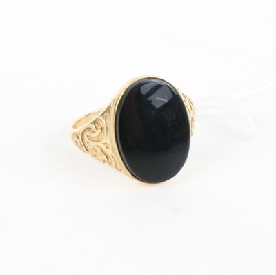 Lot 376 - A 9ct gold black onyx set signet ring, 4.6g,...